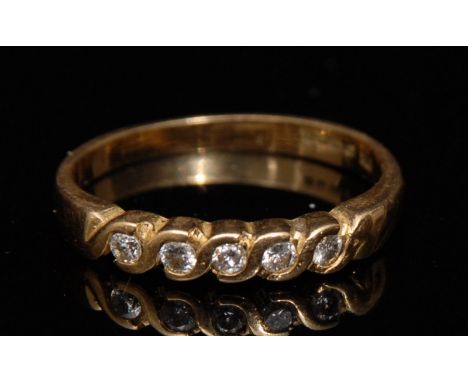 A diamond five stone half eternity ring, five round brilliant cut diamond, wave crest set, 18ct gold shank, size N, 3.0g gros