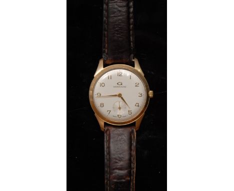 Garrard - a gentleman's 9ct gold wristwatch, Arabic numerals, champagne dial, baton indicator minute track, subsidiary second