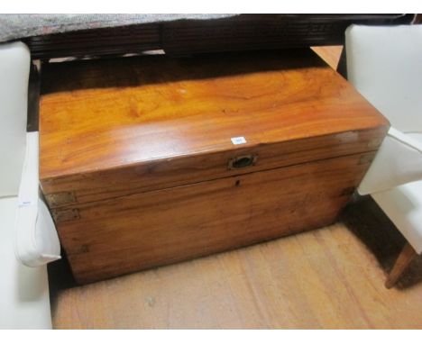 A CAMFERWOOD TRUNK with a brass inset handle and straps 55cm (h) x 107cm (w) x 56cm (d)