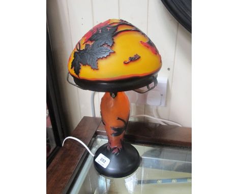 A GALLEY STYLE EMBOSSED AMBER TABLE LAMP together with shade 79cm high