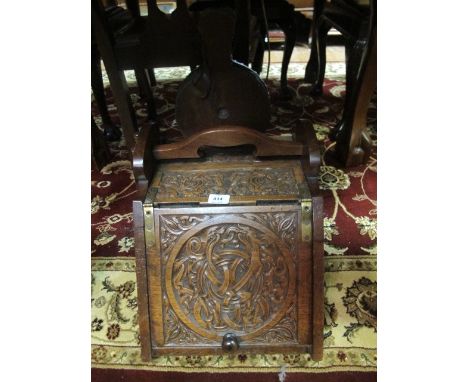 A GOOD LATE VICTORIAN CARVED OAK COAL SCUTTLE with Celtic decoration together with matching bellows