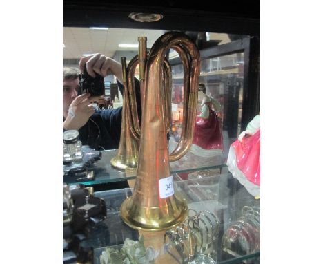 A COPPER AND BRASS BUGLE inscribed "Class A Boosey & Company London"