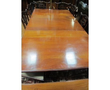 A GOOD GEORGIAN STYLE MAHOGANY TWO POD TABLE the rectangular top with rounded corners and one loose raised on twin tripod sup