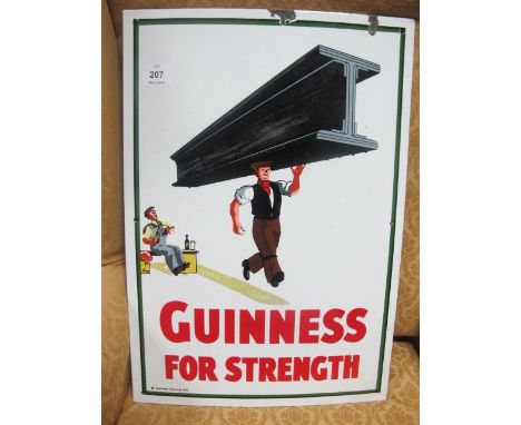 AN ENAMEL ADVERTISING SIGN inscribed "Guinness for Strength"