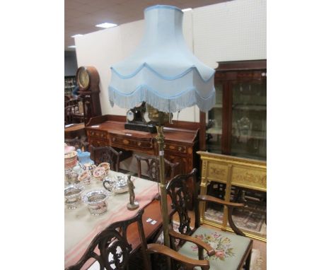 A BRASS STANDARD LAMP in Adam style with brass bowl and blue shade