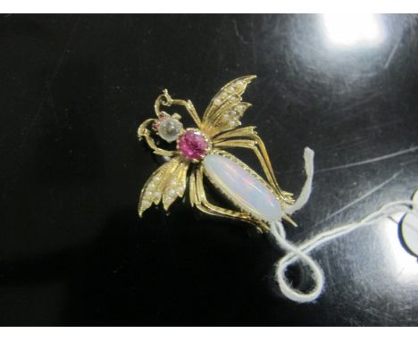 A FINE 18CT GOLD OPAL PEARL RUBY AND MOONSTONE BAR BROOCH in the form of a fly