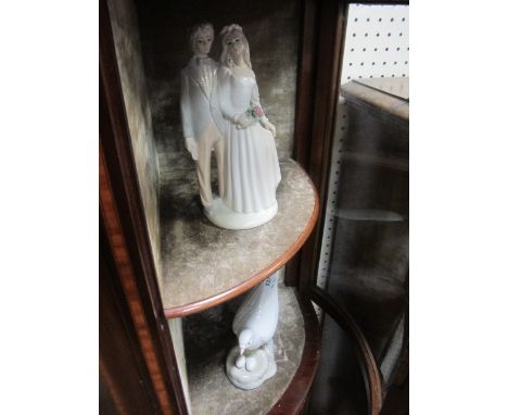 A LLADRO FIGURE of a dove together with a figure of a wedded couple