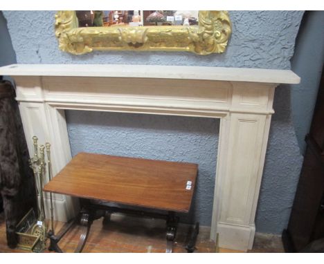 A COMPOSITION SANDSTONE FIREPLACE the rectangular shelf above a panel frieze on conforming jabs 127cm (h) x 190cm (w) x 25cm 