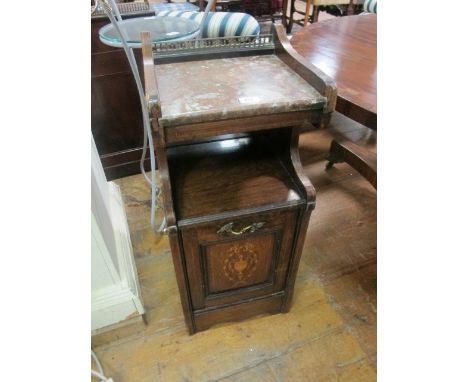 AN EDWARDIAN ROSEWOOD FUEL BIN the super structure with marble inset above an open shelf and panelled compartment on platform