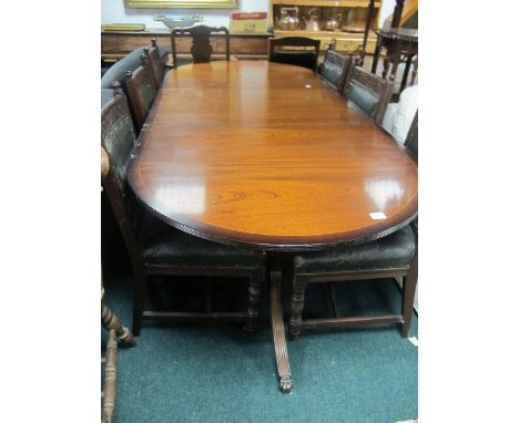 A REGENCY STYLE MAHOGANY D-END DINING TABLE raised on twin tripod supports with one loose leaf 74cm (h) x 216cm (w) x 96cm (d