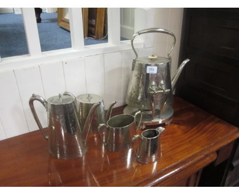 A FIVE PIECE PLATED TEA AND COFFEE SERVICE with spirit kettle