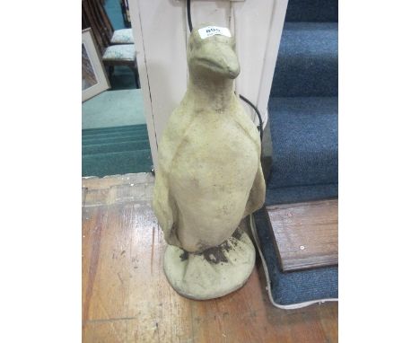 A PAIR OF COMPOSITION SANDSTONE FIGURES modelled as pelicans each shown standing 68cm high