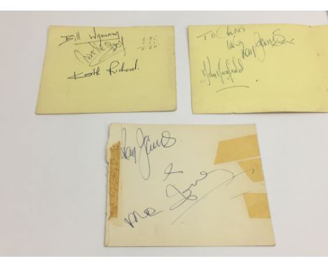 Three Rolling Stones signatures comprising Keith Richards (signed Richard), Bill Wyman and Charlie Watts plus others includin