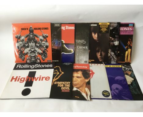 A collection of Rolling Stones records including best of collections.