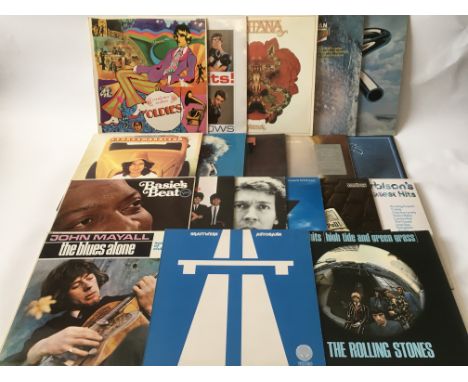 A collection of LPs by various artists including John Mayall, The Beatles, The Rolling Stones, Kraftwerk, Scott Walker and ot