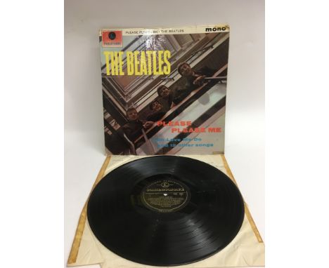 The Beatles debut LP 'Please Please Me' on black and gold Parlophone labels and in Mono. Possibly a crossover 2nd pressing th