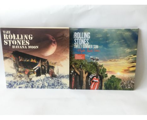 Two Rolling Stones 3LP 1DVD sets comprising 'Havana Moon' and 'Sweet Summer Sun - Hyde Park Live'. Condition for all is NM.