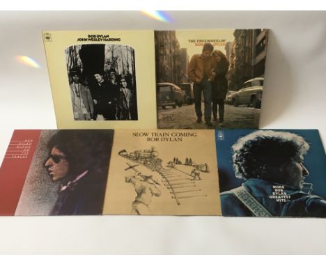 Five Bob Dylan LPs including a reissue of 'Freewheelin', 'Blood On The Tracks', 'John Wesley Harding' and others.