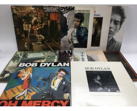 A collection of 24 Bob Dylan and related LPs including 'Highway 61 Revisited', 'Desire', 'The Historic Basement Tapes', 'Bloo