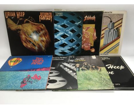 Eight rock LPs by various artists including Black Sabbath, Ten Years After, Uriah Heep and The Who.