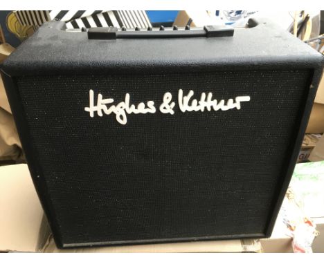 A Hughes &amp; Kettner edition blue 60R guitar amplifier.