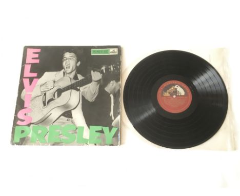 A first UK pressing of Elvis Presley's 'Rock n Roll' LP. Condition of vinyl is good with light surface marks, minimal wear to