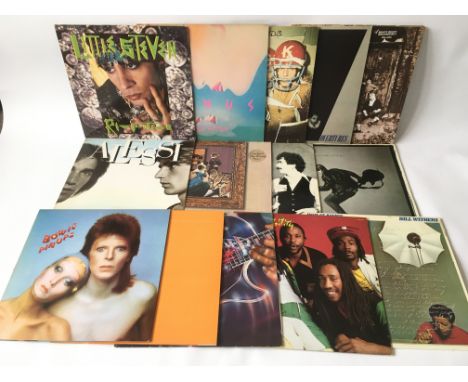 A collection of rock, reggae, jazz and soul LPs including David Bowie, The Who, Style Council, The Cimarons and others.