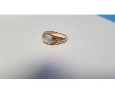 A VINTAGE MOONSTONE RING, in unmarked yellow metal. Approx. weight 3.3 gSize S