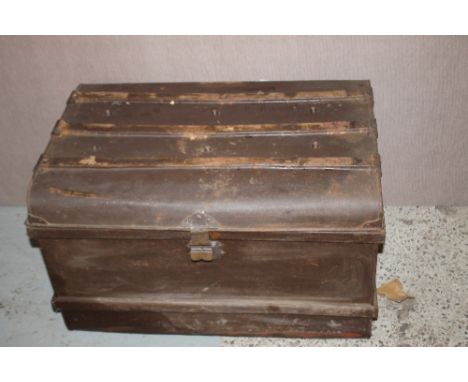 A METAL TRAVEL TRUNK