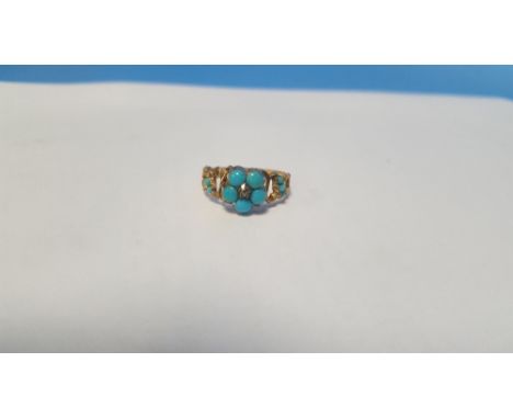 A VINTAGE TURQUOISE AND DIAMOND RING, in unmarked yellow metal, approx. weight 2.2 gThere is one stone missing from the side 