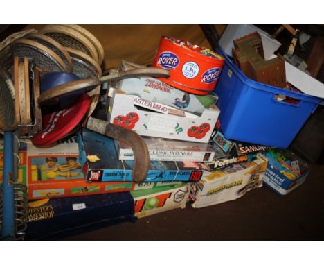 A QUANTITY OF VINTAGE GAMES ETC. TO INCLUDE LEGO, TENNIS RACQUETS, HOCKEY STICKS ETC.