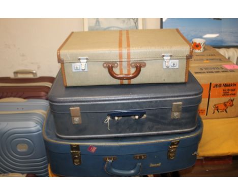 THREE VINTAGE SUITCASES