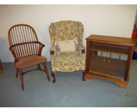THREE ITEMS TO INCLUDE A PALACE FURNITURE STICK BACK CHAIR, AN EASY FIRESIDE CHAIR, A TEAK GLAZED BOOKCASE (3)