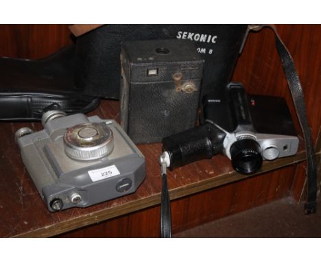 A KODAK NO 120 CAMERA, A POLA VISION LAND CAMERA, AND A SEKONIC SIMPLOMAT CAMERA