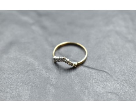 A seven stone diamond wishbone ring, total approx 0.25ct on a 9ct gold loop, size O &amp; approx 1.1g