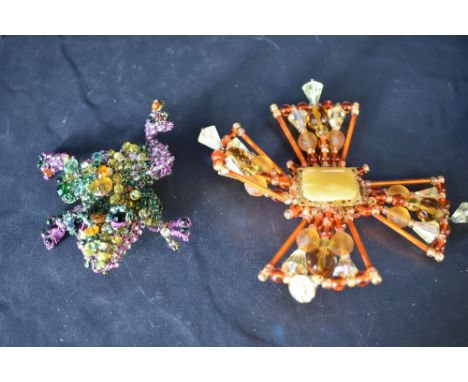 A 1980's vintage beaded brooch by Susan Horth modelled as an oversized frog and another similar vintage beaded brooch in the 