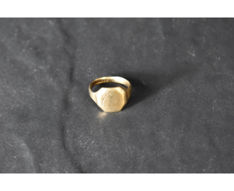 A 9ct gold signet ring having worn decorative engraving to square panel, size N &amp; approx 4.4g