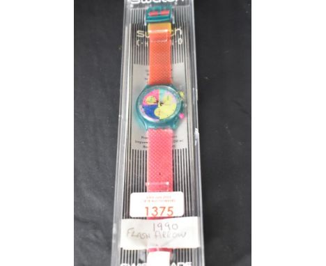 A Swatch 'Flash Arrow' SCL100, chronograph wristwatch circa 1990/91, with plastic case, original sales receipt and guarantee.