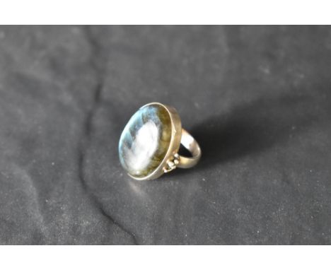 A large labrodite butterfly wing stone silver ring, size Q