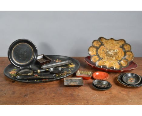 A collection of 19th and 20th century papier mache,  comprising of mostly trays. Several have superb inlay with mother of pea