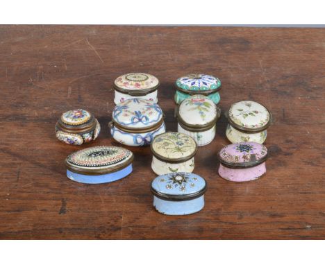 A collection of mainly 18th and 19th century Bilsten enamel patch boxes,&nbsp; all hand-painted with flowers and geometric de