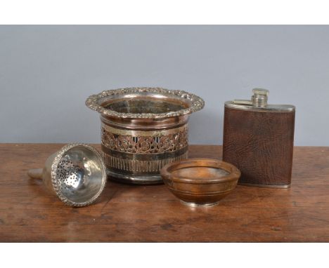 A Georgian silver plated wine coaster,  17 cm diameter, together with a silver plated wine funnel, a French treen silver foot