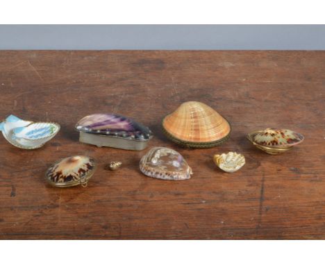 A group of shell patch and trinket boxes,&nbsp; together with other shell pieces, some with hand-painted decoration, the larg