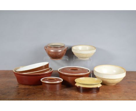 A collection of French ceramic cookware, including two ceramic mixing bowls, the largest 24cm in diameter and an assortment o