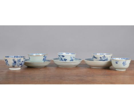 A group of 18th century Chinese blue and white hand-painted tea wares,  to include a landscape tea bowl and saucer, a floral 