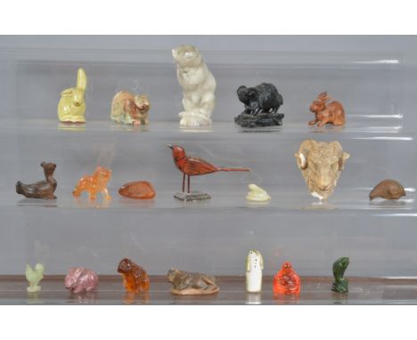 A large collection of assorted animal figurines, including jade, wood, hardstone and glass examples, the large hardstone cat 