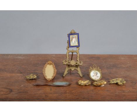 Two 19th century framed portrait miniatures, one in gilt metal frame on ivory, one in enamel frame, together with a further g