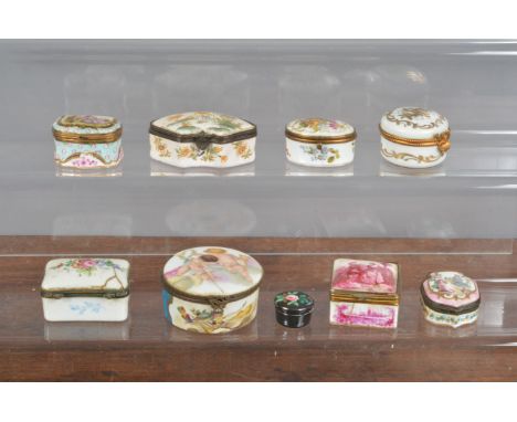 A group of 19th and 20th century Continental ceramic patch boxes,&nbsp; all with metal mounts, some painted with scenes, some