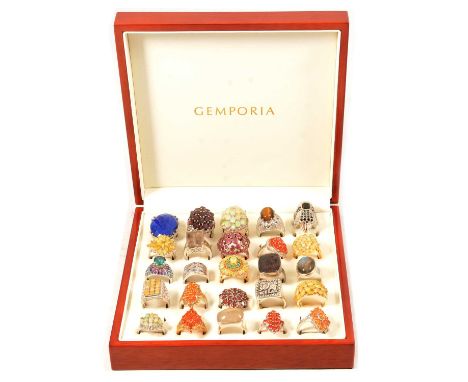 Twenty-five large gemset silver rings, garnet, rutilite and others, a Malawi garnet and white topaz ring, in a floral design 