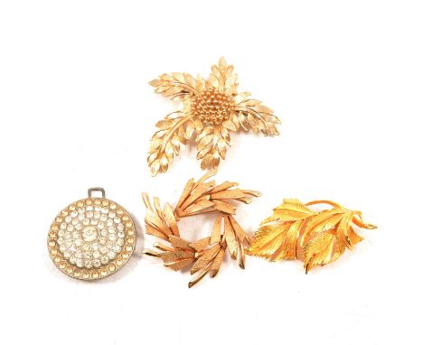 A collection of vintage silver and costume jewellery, gilt metal and paste set brooches; an Edwardian gold-plated brooch with